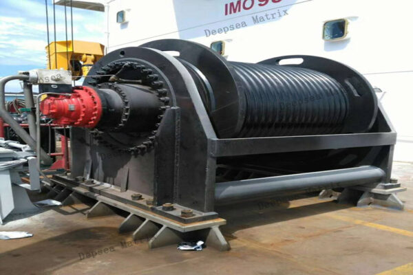 Heavy-duty winch lifting materials on building site