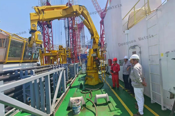 A heavy-duty offshore crane installing a wind turbine at sea Chinese manufacture
