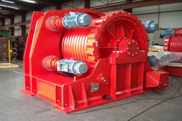 A modern, efficient electric winch on a deck.