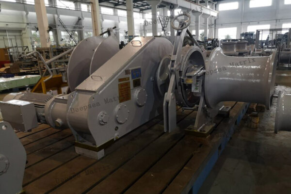 Mooring winch securing ship at berth