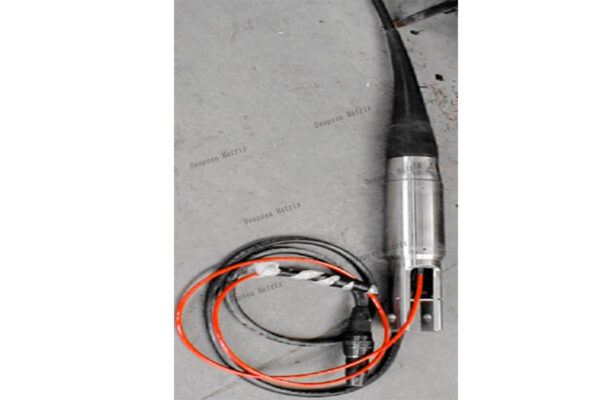 A robust potted load head termination on an armored cable.