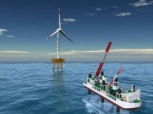 L-frame crane installing offshore wind turbine.